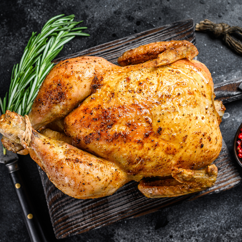 Roasted chicken with rosemary sprig